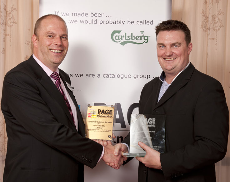 Brian Hayward presenting Lloyd Simpson with the Page Gold Distrubutor of the Year award